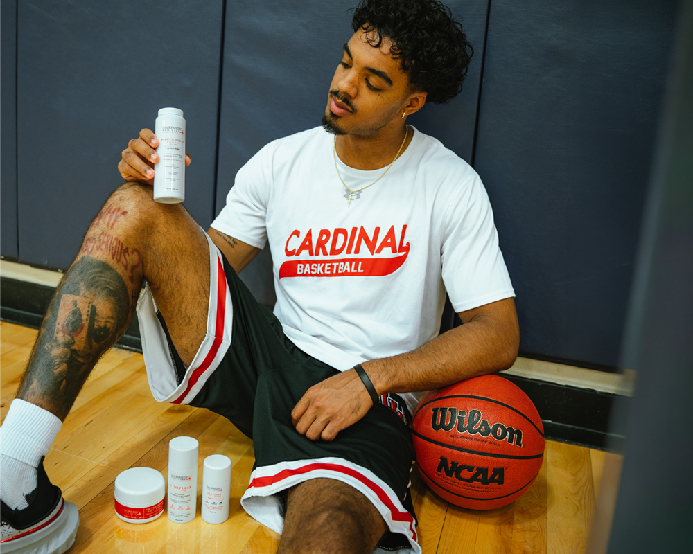 Basketball player holding POWERHOUSE Powder